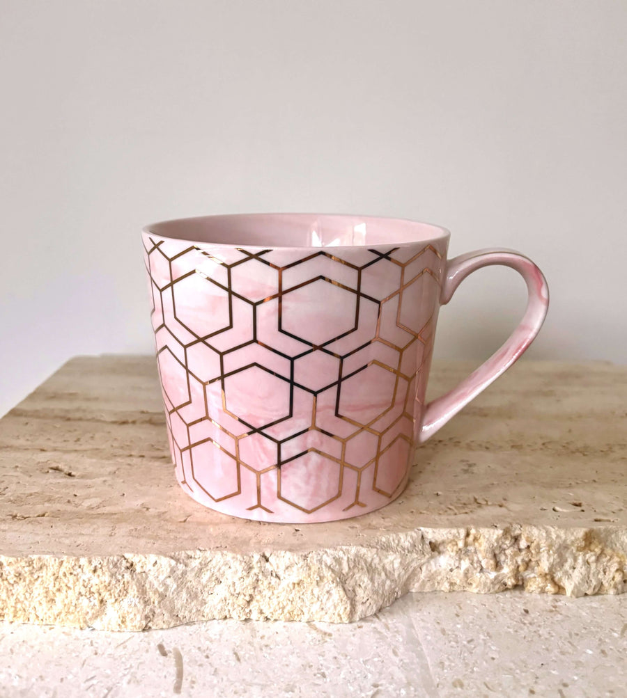 pink and gold hex mugs