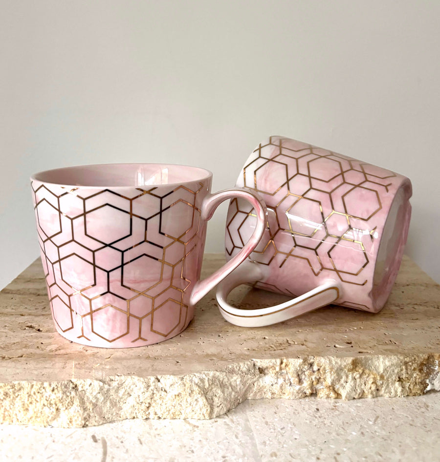 pink and gold hex mugs