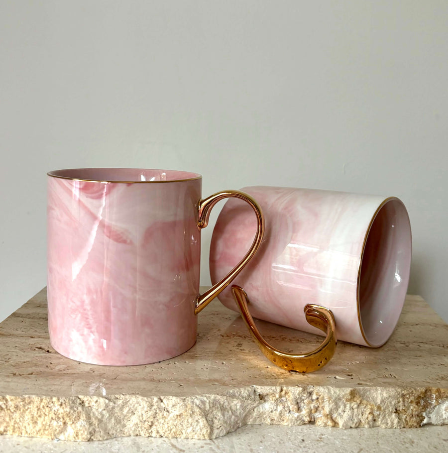 Pink and gold mugs