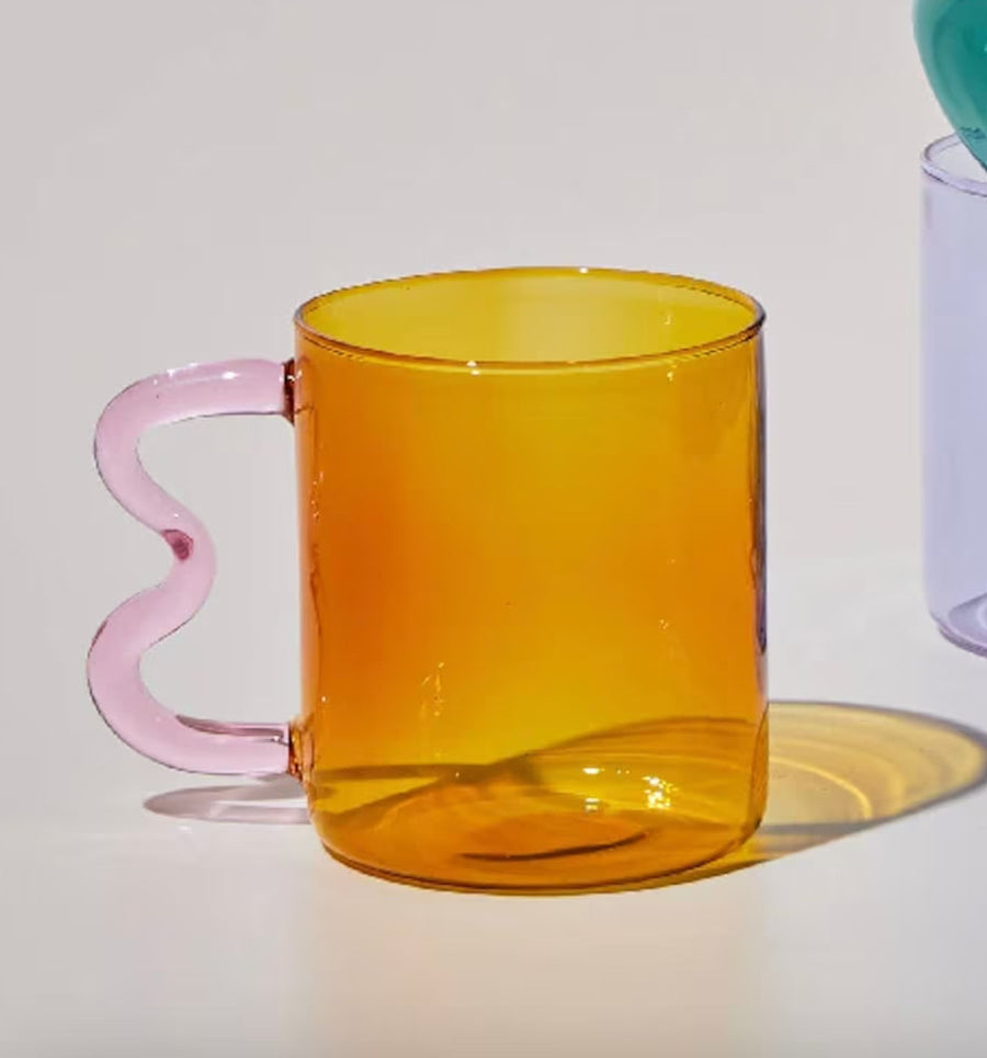 Orange wavy glass cup