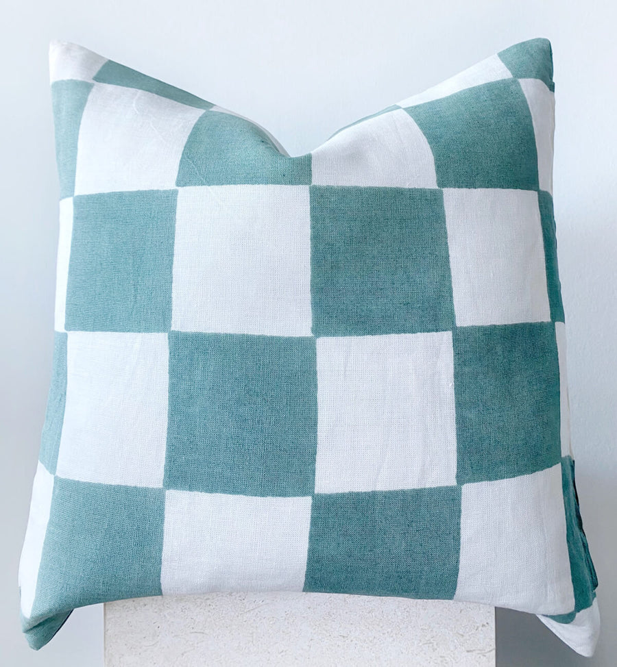 blue and white checkered cushion