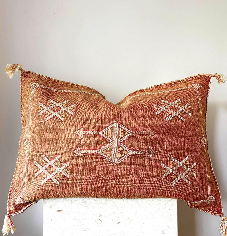 Moroccan cactus silk lumbar cushion in rust