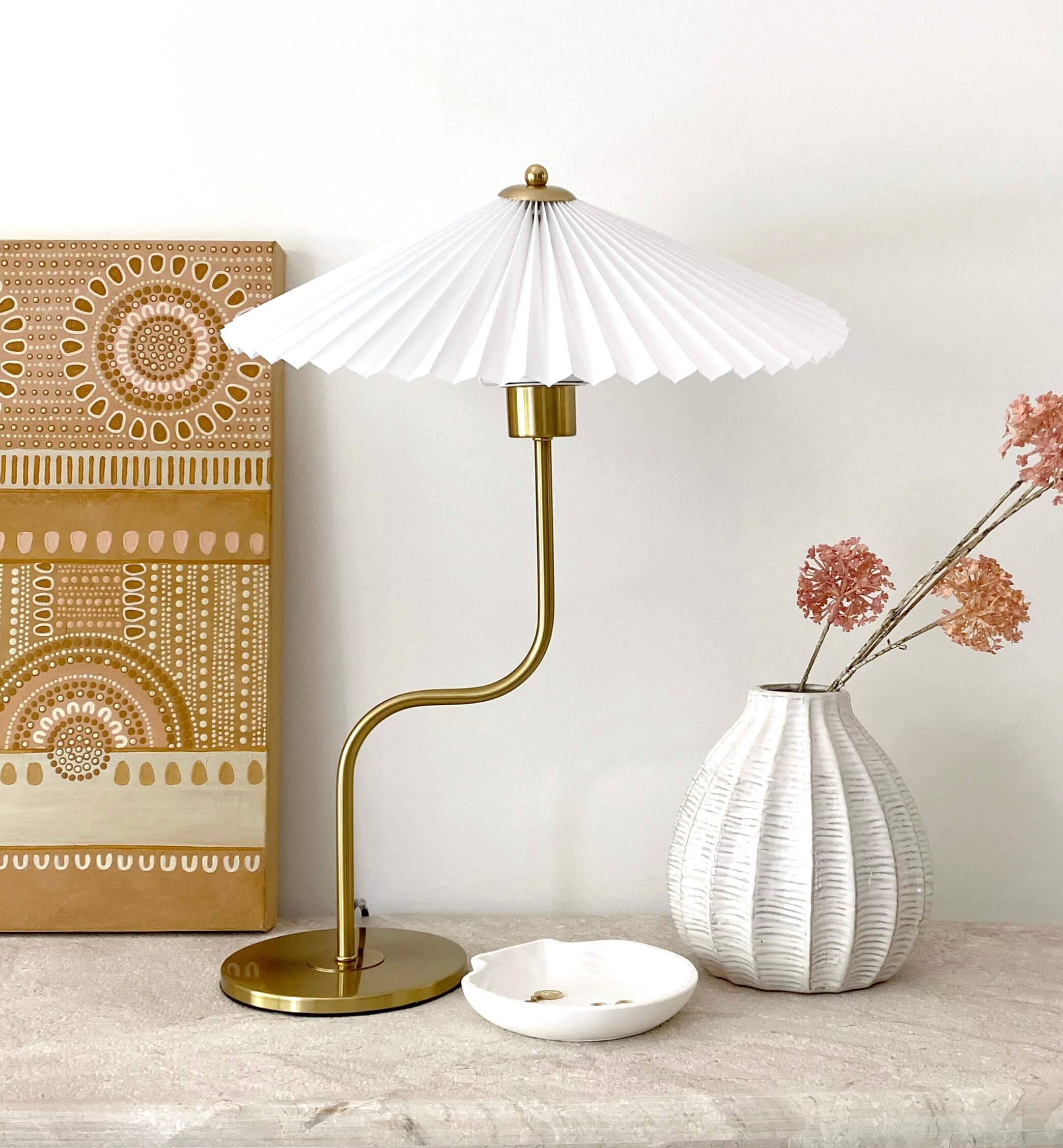 Aztec House | Pleated table lamp with brushed gold curved base | Homewares Australia