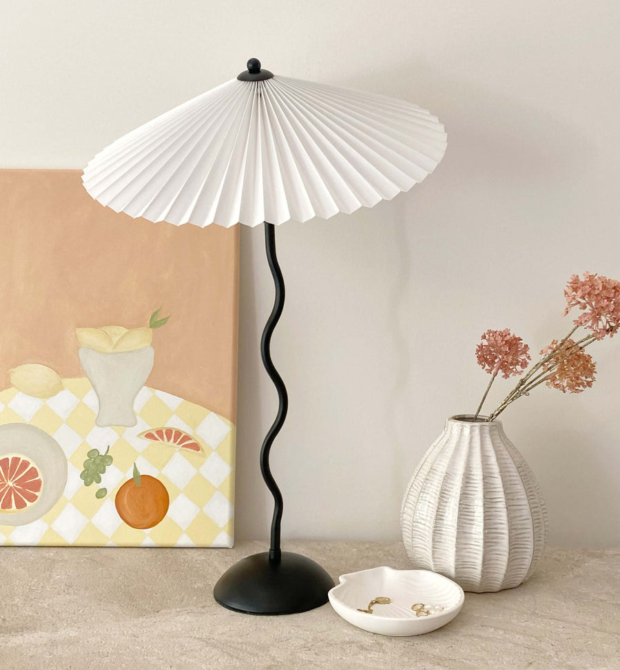 black squiggle wavy lamp with pleated shade