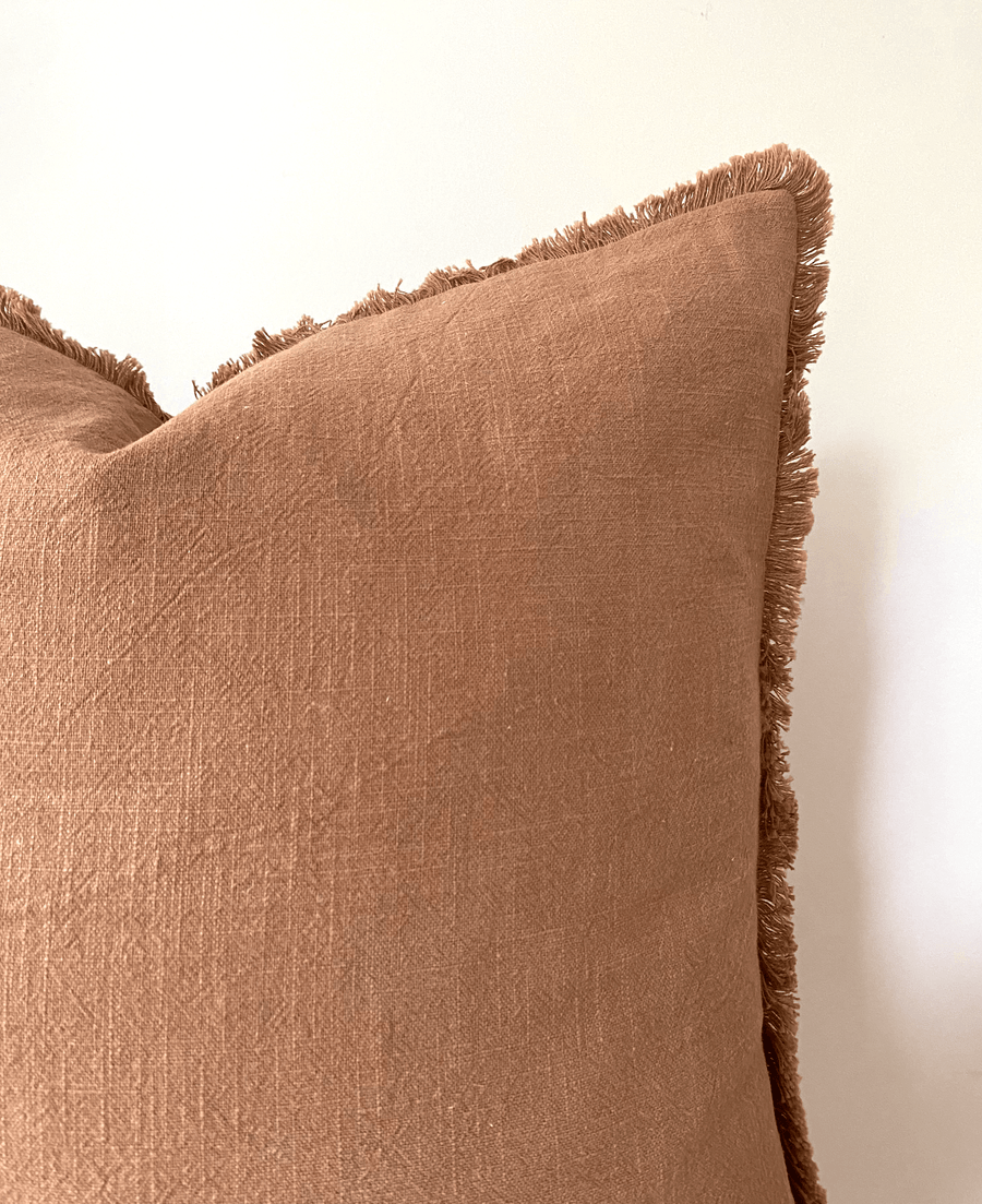 Tan brown fringed cotton cushion